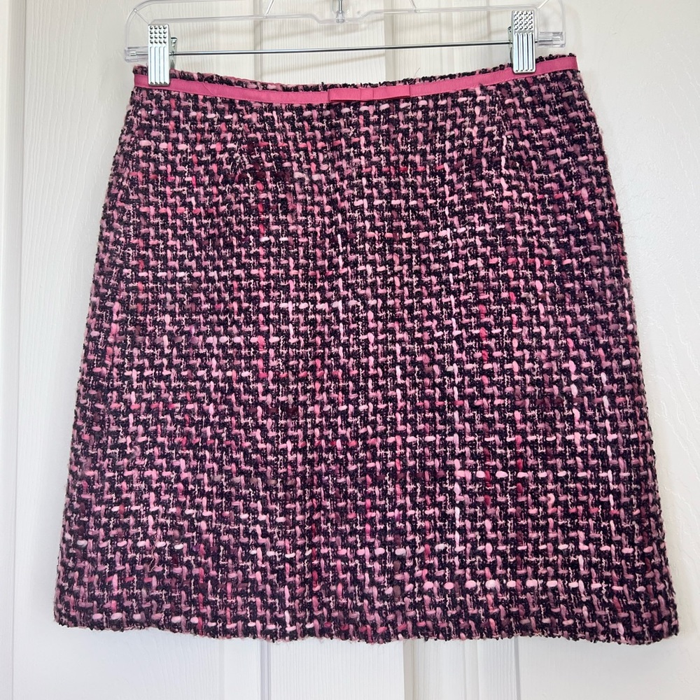 Petite Inc mini tweed skirt, embellished with pink bow ribbon, lined.